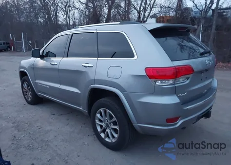 2014 Jeep Grand Cherokee Overland z USA, uszkodzony, nr VIN 1C4RJFCGXEC172655